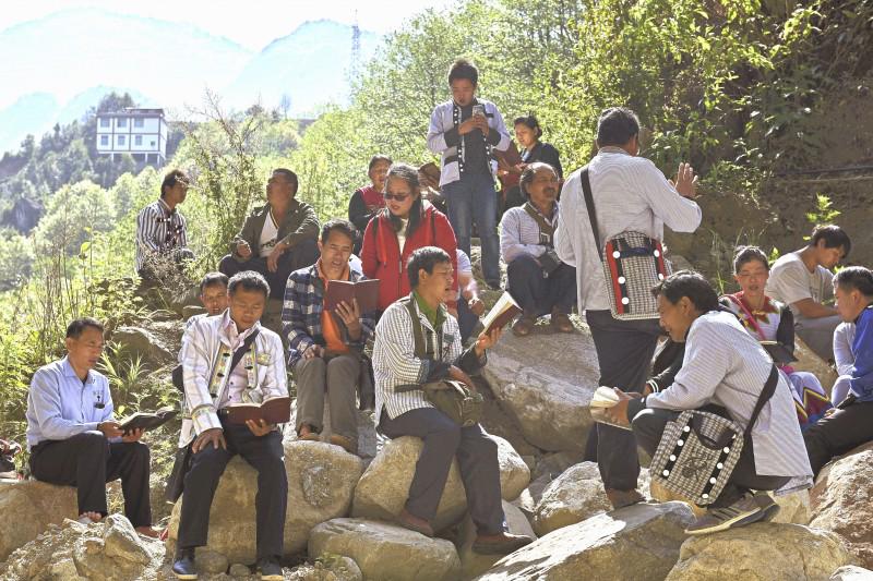 The Lisu believers sang hymns before the baptism service, April 1, 2018.