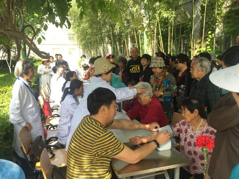 The nine doctors offered medical service to mothers on May 13, 2018.