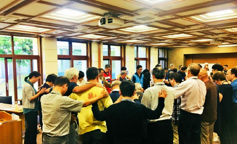 The participants of the fifth Annual Christian Forum for Reconciliation in Northeast Asia prayed together.