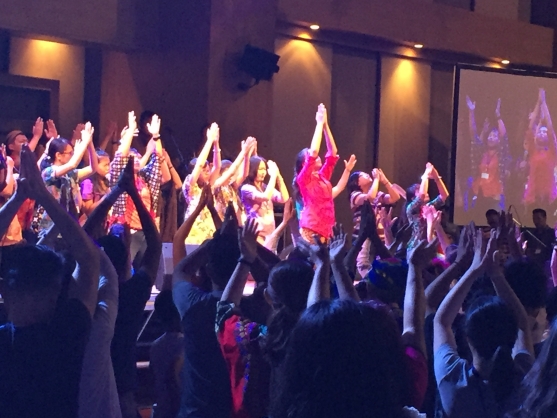 The young Christians in the worship service.