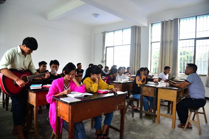 The students of Yingjiang County Christian Training Center in the class