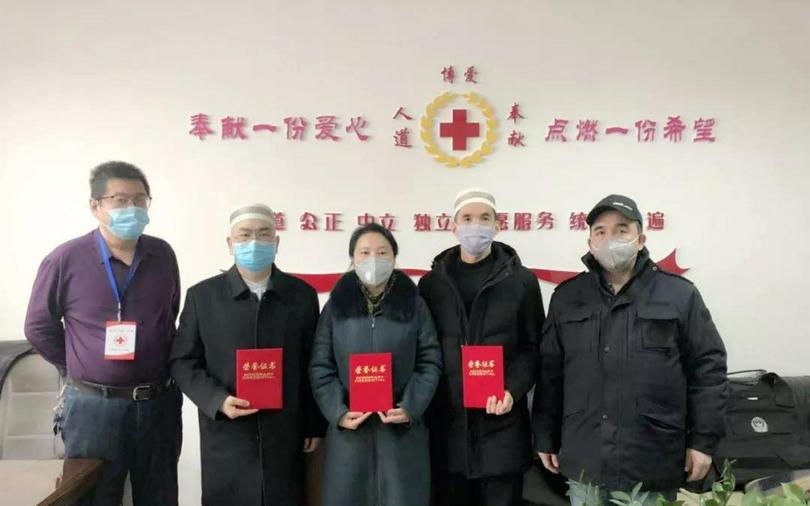 The donation ceremony inside the Midong Distrct red cross, attended by the Christian and Islamic representatives