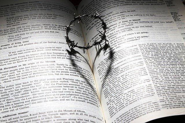 A thorny ring on the Bible