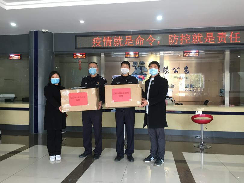 Wuxi International Church donated masks to a local police station on March 18, 2020.