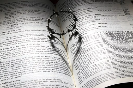 Passion Week: a thorny crown on the Bible.