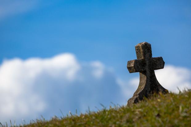 A cross on the grass
