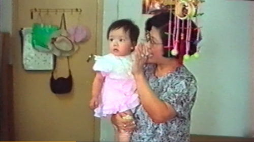 The deceased grandmother of Christian singer G.E.M. holding her