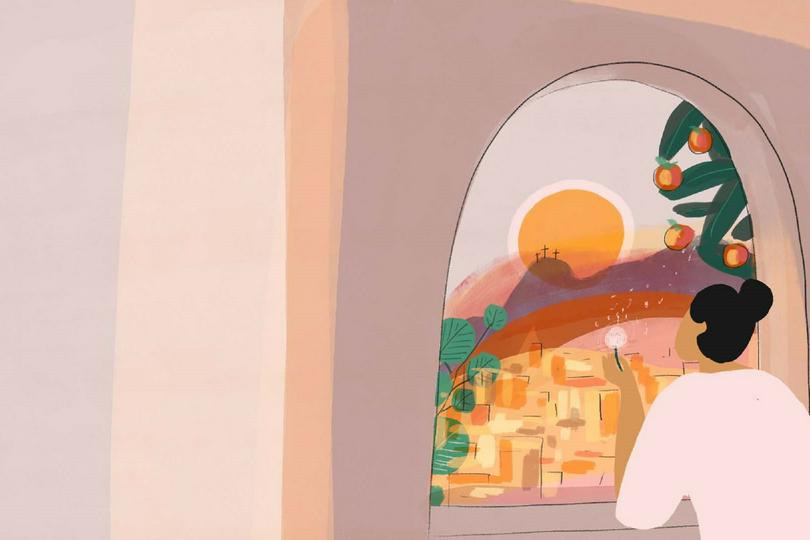 A woman looks outside from the window.