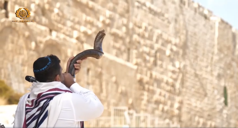 A man blew a shofar to begin the ingathering of the Nations in Jerusalem of the 42nd Sukkot celebration from the Southern Steps, Israel, on September 20, 2021.
