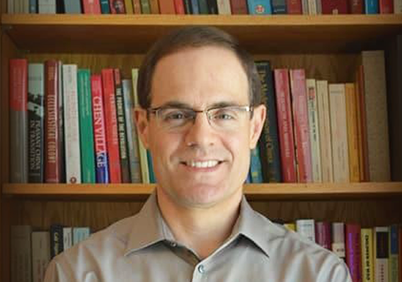 Dr. John Barwick, a history lecturer at Cornell University