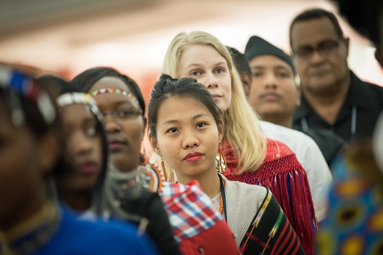 People of different races stood in line.