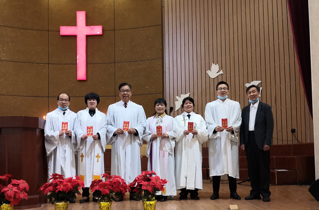 Six pastors were pictured after the Good Shepherd Sunday service holding red envelopes with money inside which was given by Chengdong Church in Pingnan, Ningde, Fujian Province, on May 8, 2022.