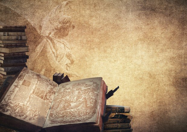 A picture shows an angel besides the Bible.