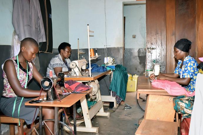 Students learn dress-making and tailoring skills at the United Methodist Church Women Training Center in Bugembe, Uganda.