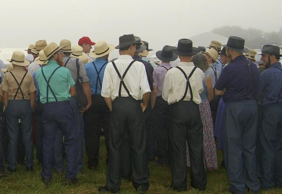 A picture shows some men gathering.