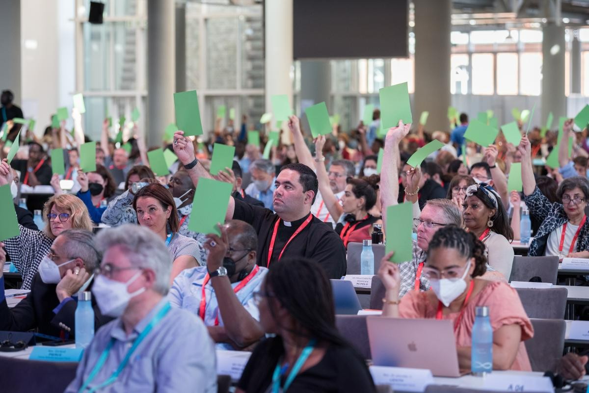 Assembly delegates vote to approve a list of new Central Committee members on 6 September 2022 during a business plenary session at the 11th Assembly of the World Council of Churches, held in Karlsruhe, Germany from 31 August to 8 September, under the theme "Christ's Love Moves the World to Reconciliation and Unity."