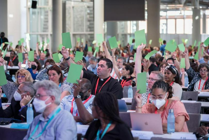Assembly delegates vote to approve a list of new Central Committee members on 6 September 2022 during a business plenary session at the 11th Assembly of the World Council of Churches, held in Karlsruhe, Germany from 31 August to 8 September, under the theme "Christ's Love Moves the World to Reconciliation and Unity." 