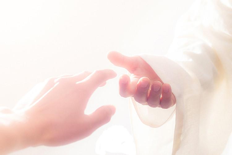 A picture show Jesus' hand moving to the other hand