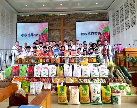 The choir members took a group picture after a Sunday service to celebrate the Autumn Harvest Festival in Shuishiying Church, Dalian, Liaoning, on October 16, 2022.