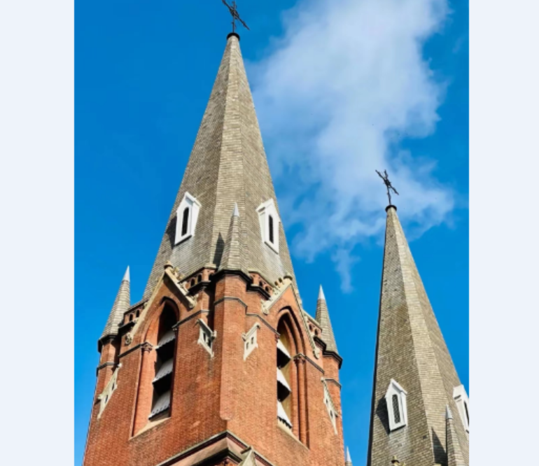 The soaring roof of Shanghai St. Ignatius Cathedral with a cross