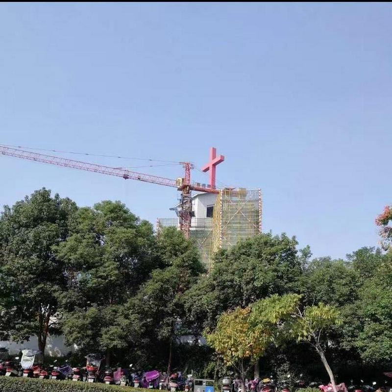 Another picture recently circulating on the Internet shows that the cross which had topped the Hudson Taylor Memorial Tower was being removed.